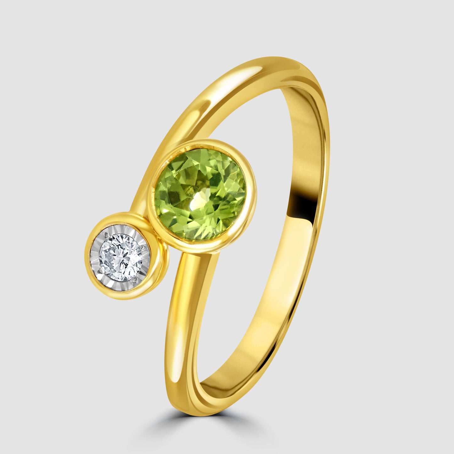 Contemporary peridot and diamond cross over ring