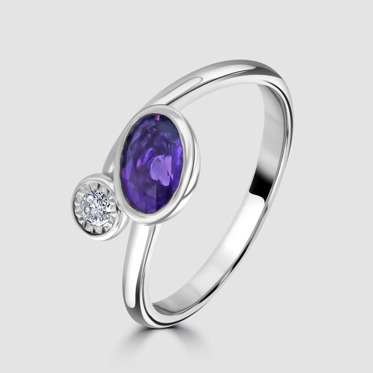 Amethyst and diamond cross over ring