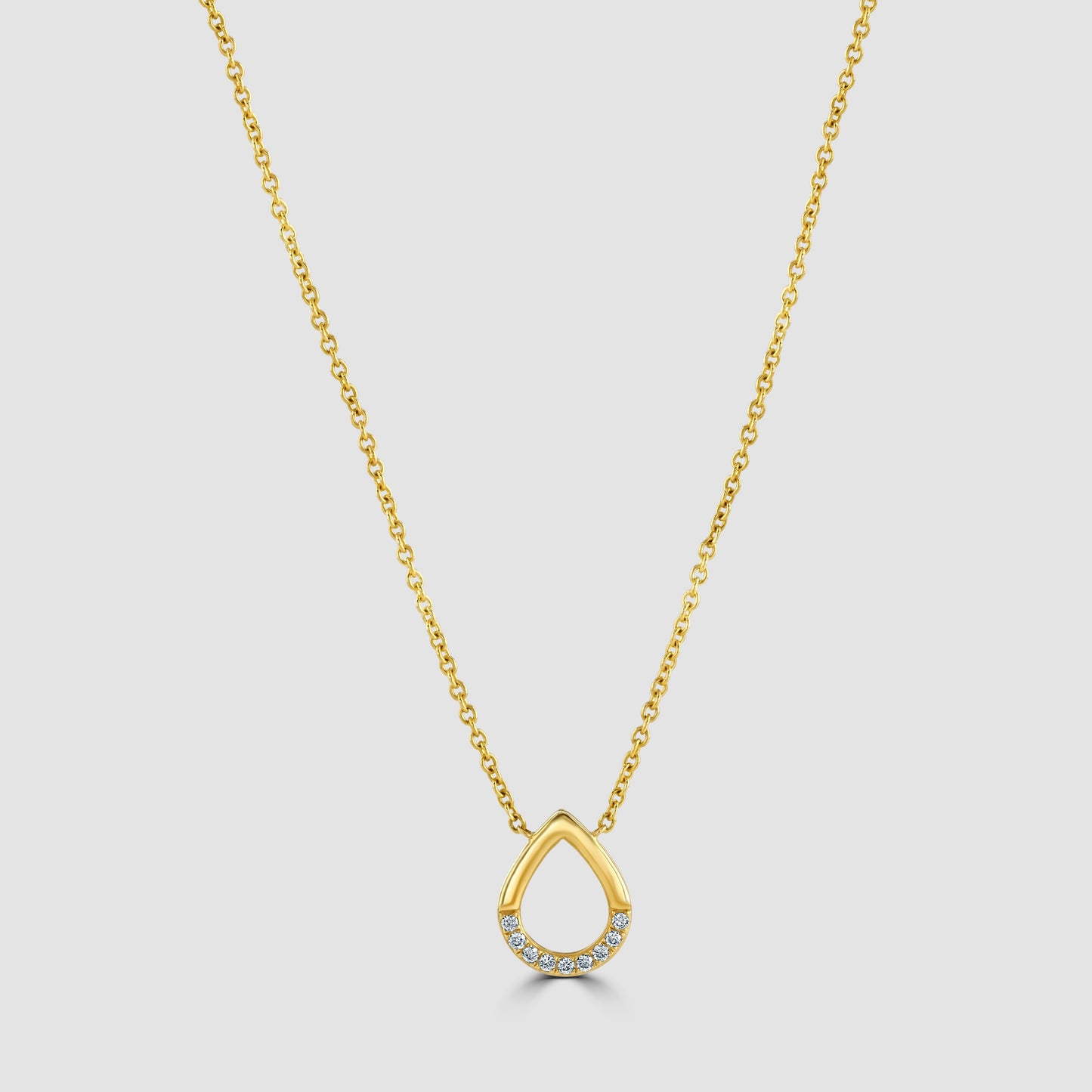 Teardrop pendant set with diamonds and chain