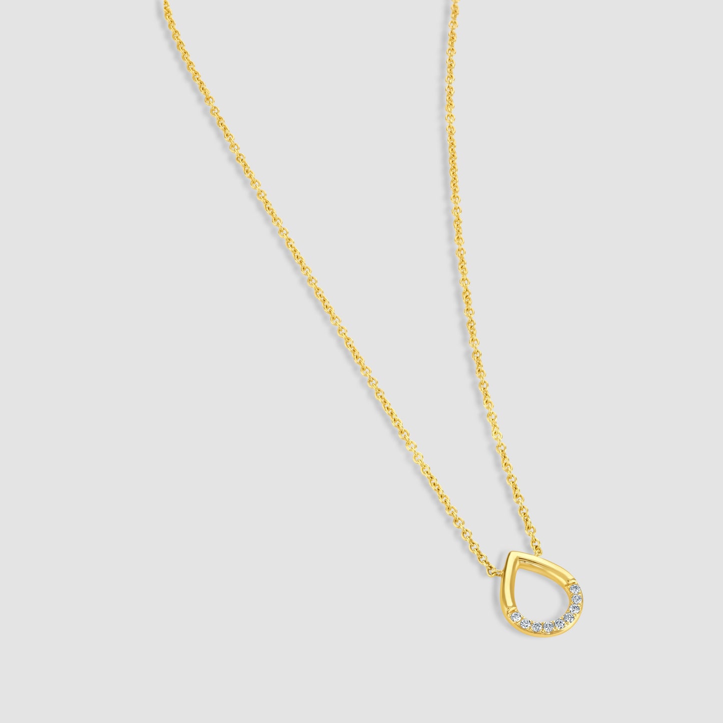 Teardrop pendant set with diamonds and chain