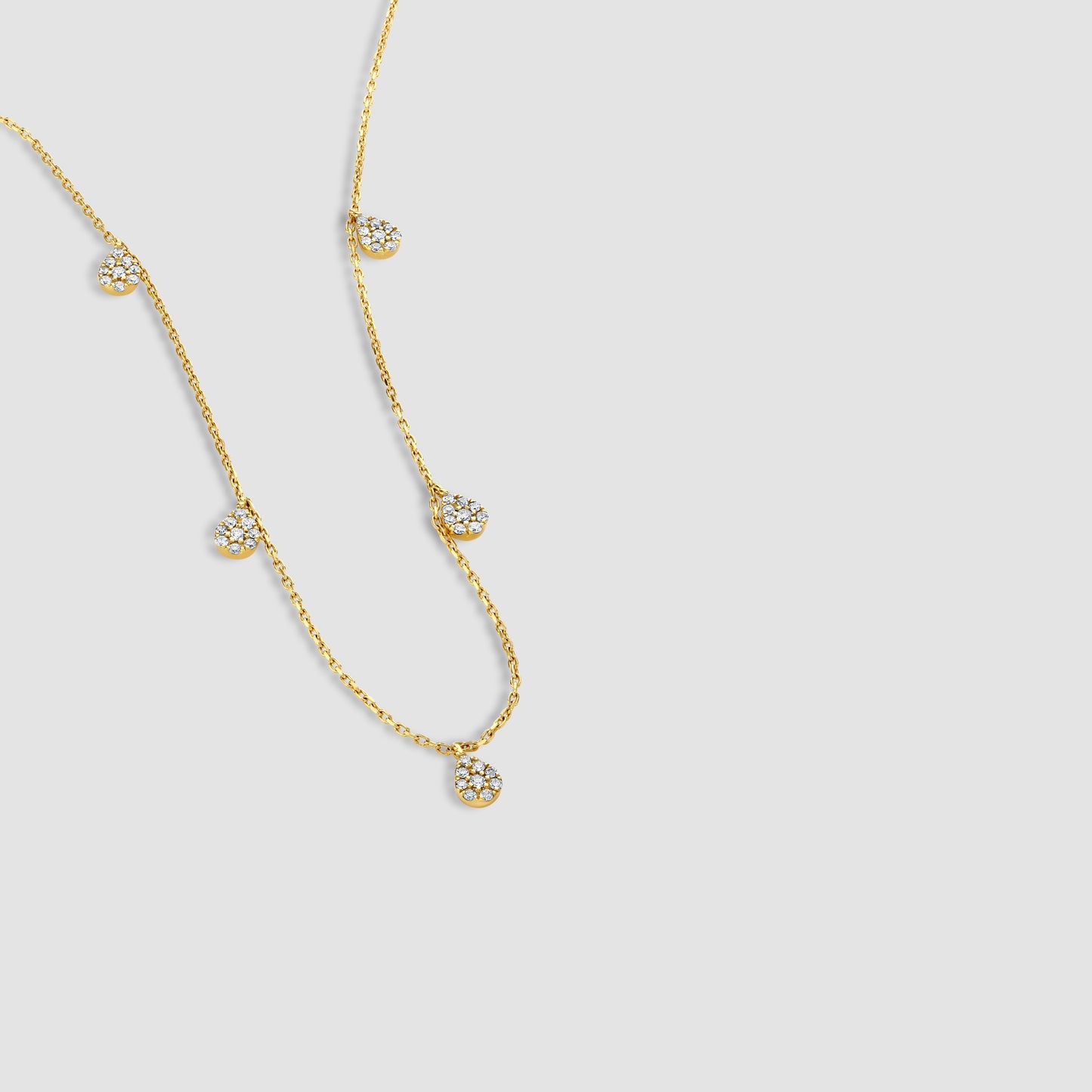 Necklace with pave set droplets
