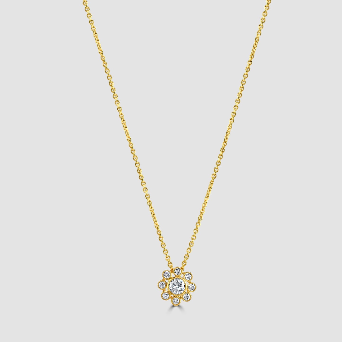 Millgrain edge diamond set floral pendant