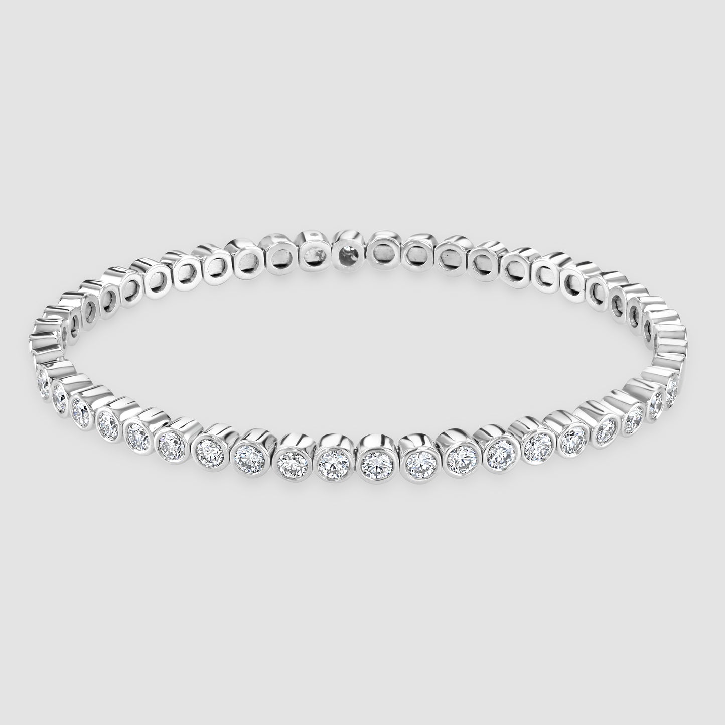 White gold rub over set diamond bangle