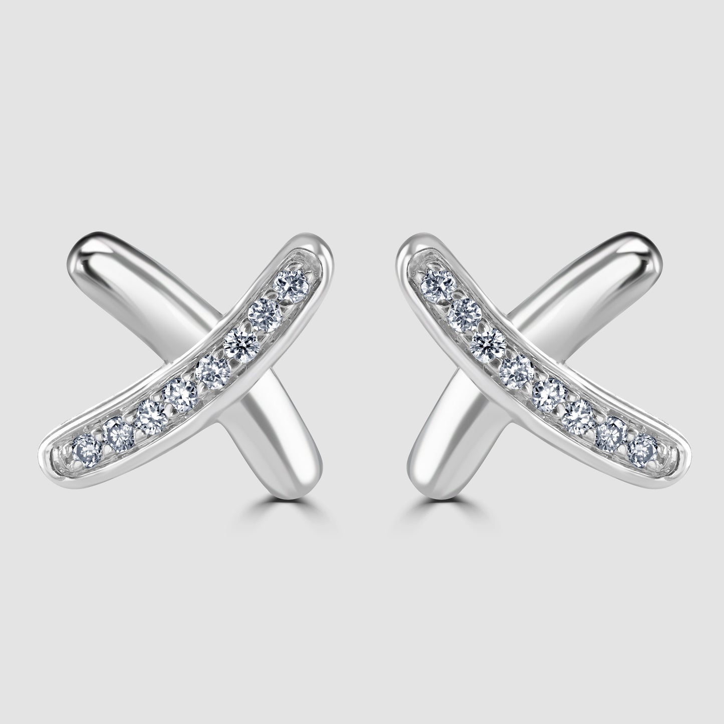 Diamond set kiss cross stud earrings