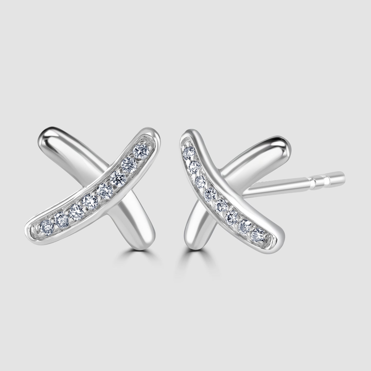 Diamond set kiss cross stud earrings