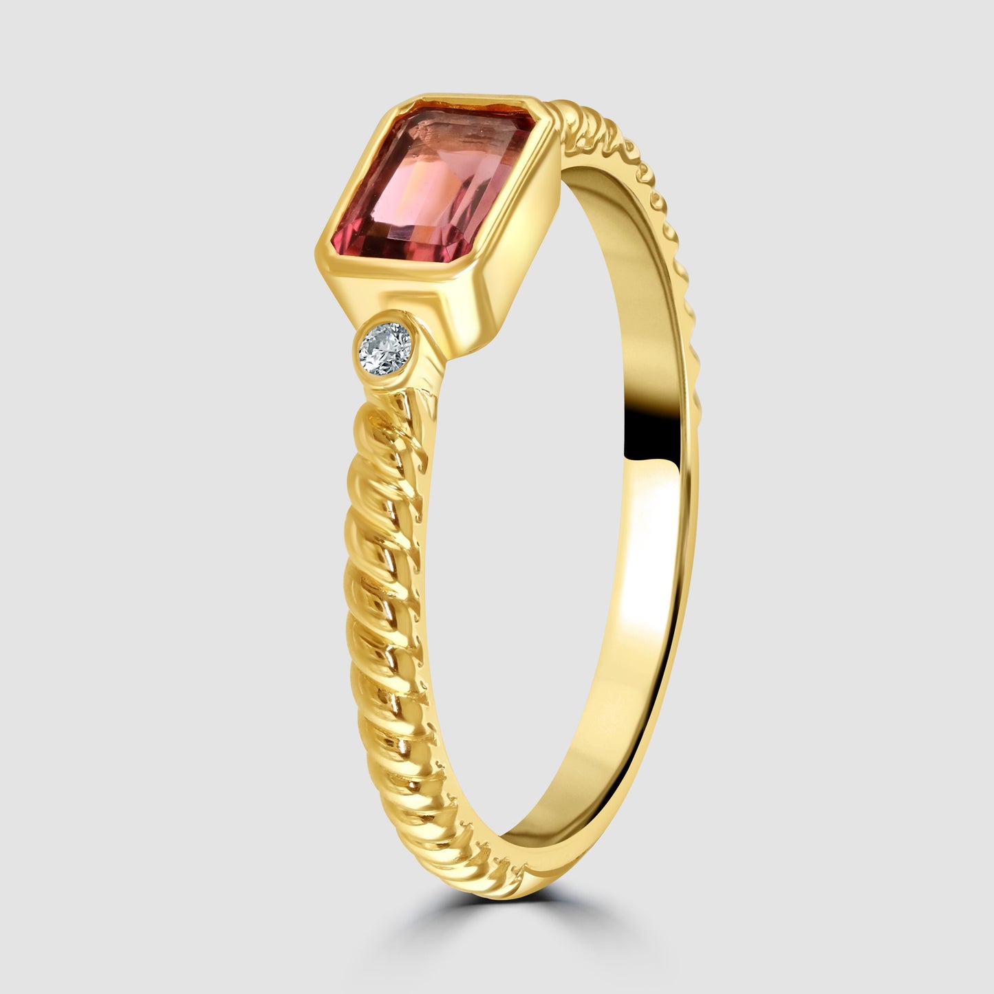 Yellow gold pink tourmaline and diamond ring