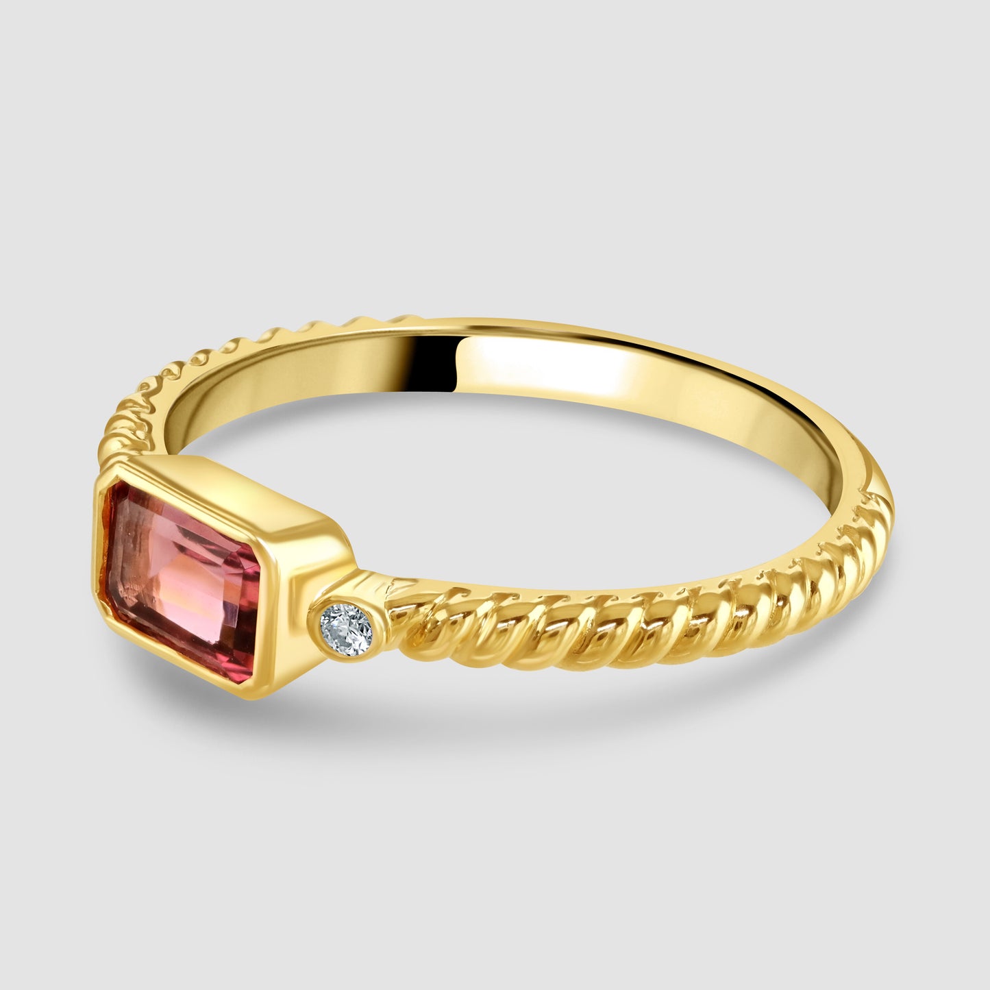 Yellow gold pink tourmaline and diamond ring