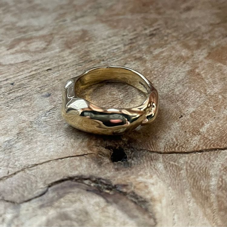 An 18ct gold wedding band from Lulu and Boo Jewellery.
