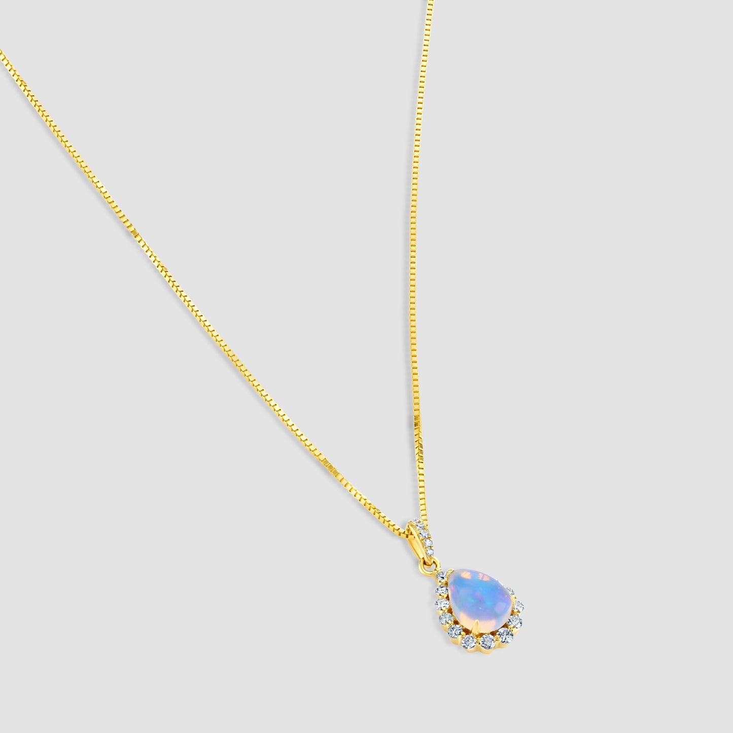 Opal and diamond teardrop pendant and chain