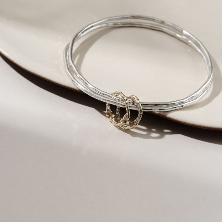 Molten Halo Sterling Silver Charm Bangle from Lulu and Boo Jewellery.