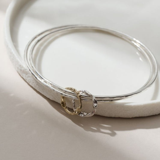 Molten Halo Sterling Silver Charm Bangle from Lulu and Boo Jewellery.