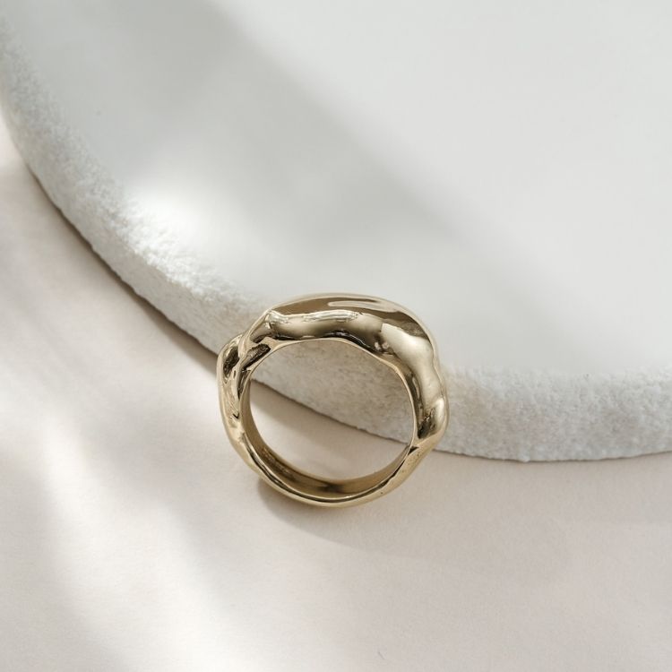 An 18ct gold wedding band from Lulu and Boo Jewellery.