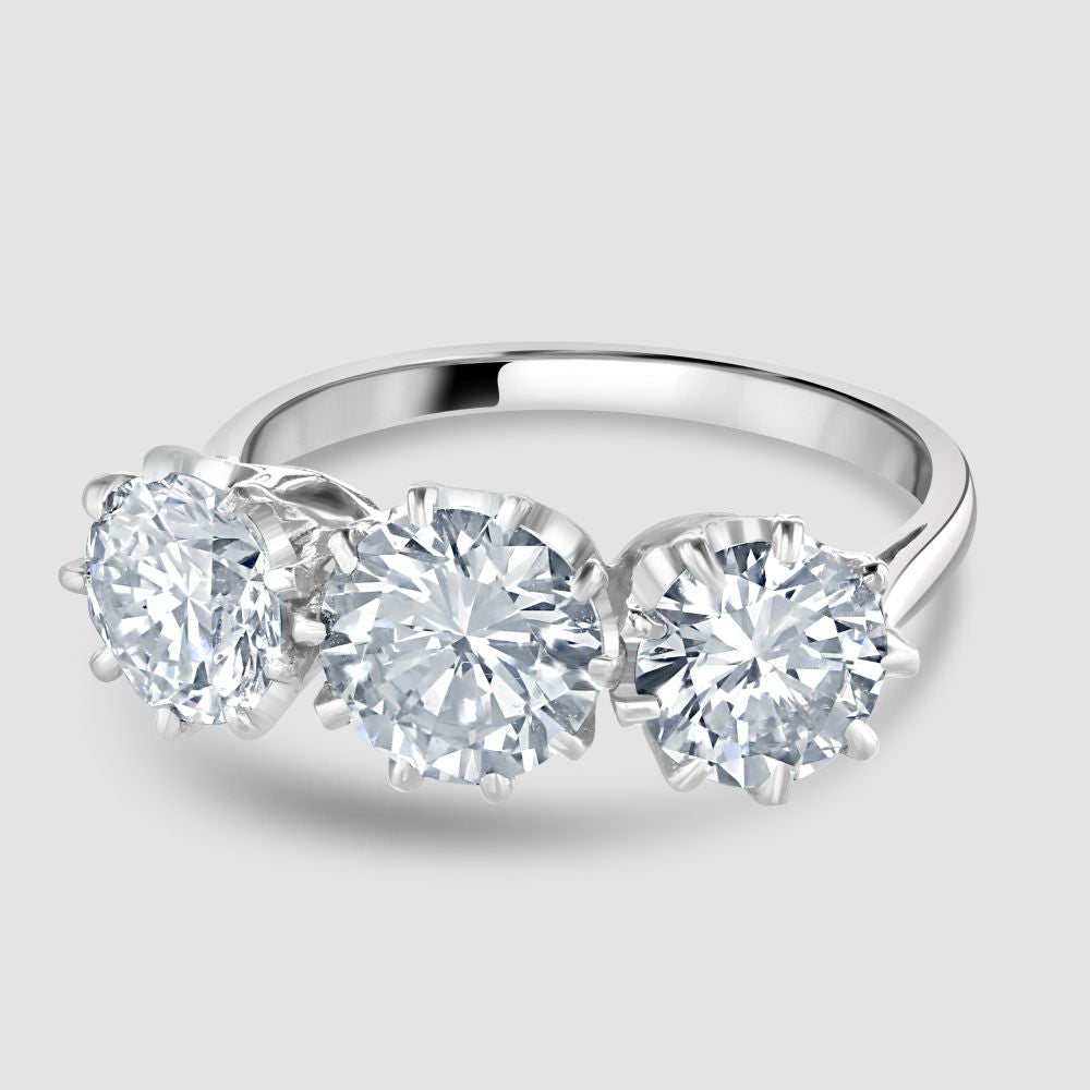 Diamond three stone ring claw set