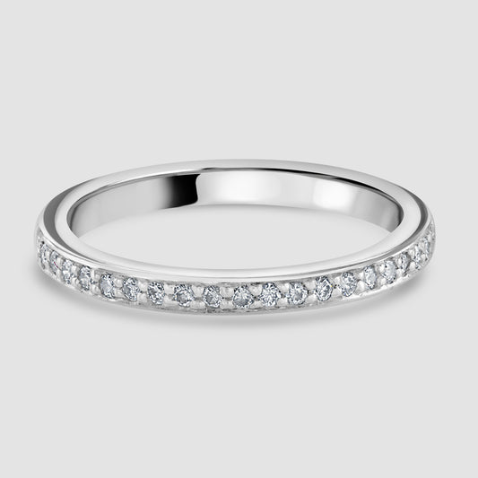 Platinum claw set diamond half eternity ring