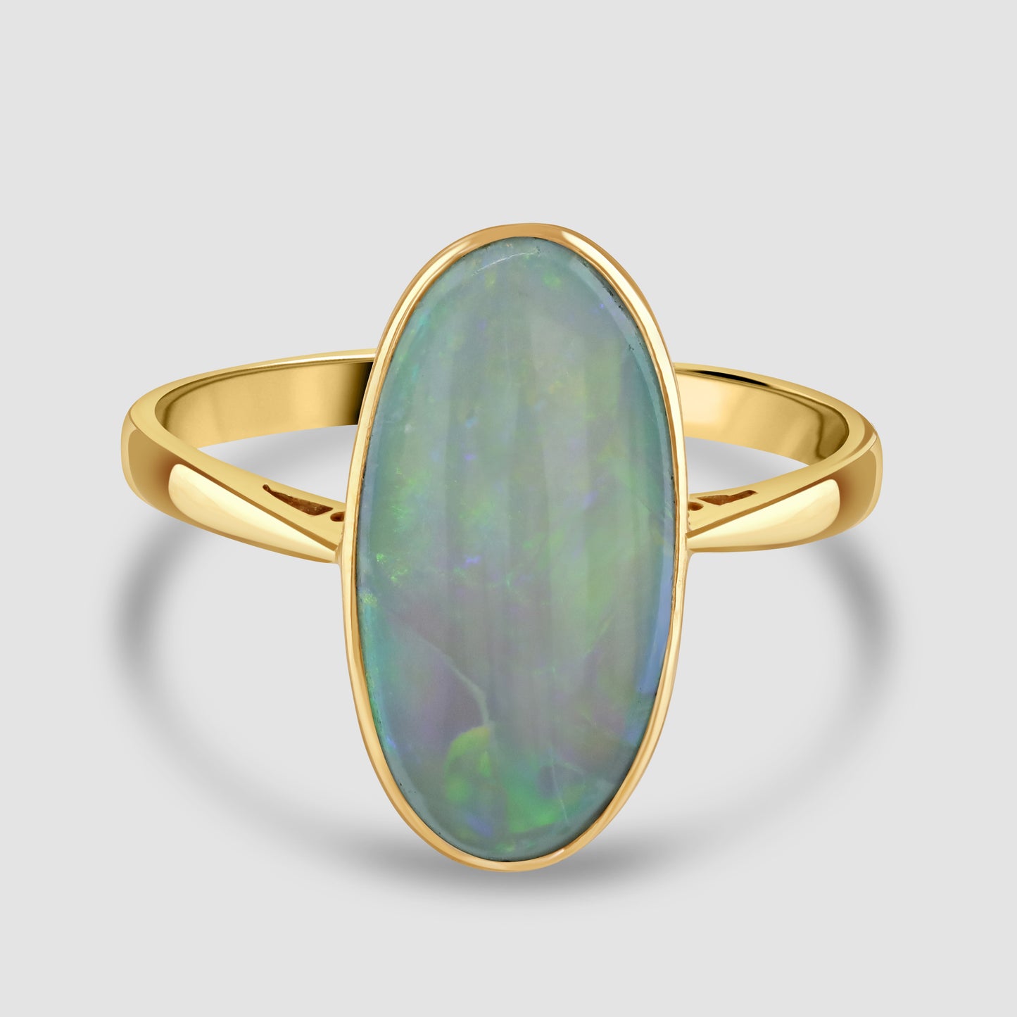 Long oval opal single stone ring