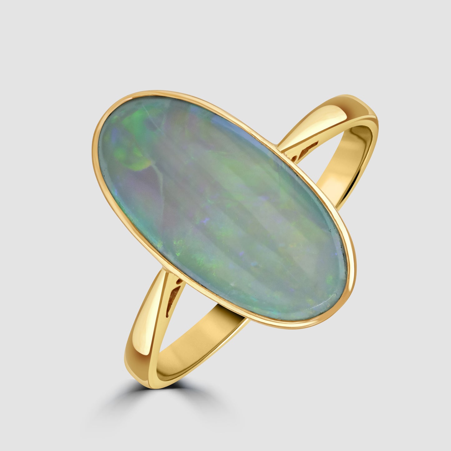 Long oval opal single stone ring