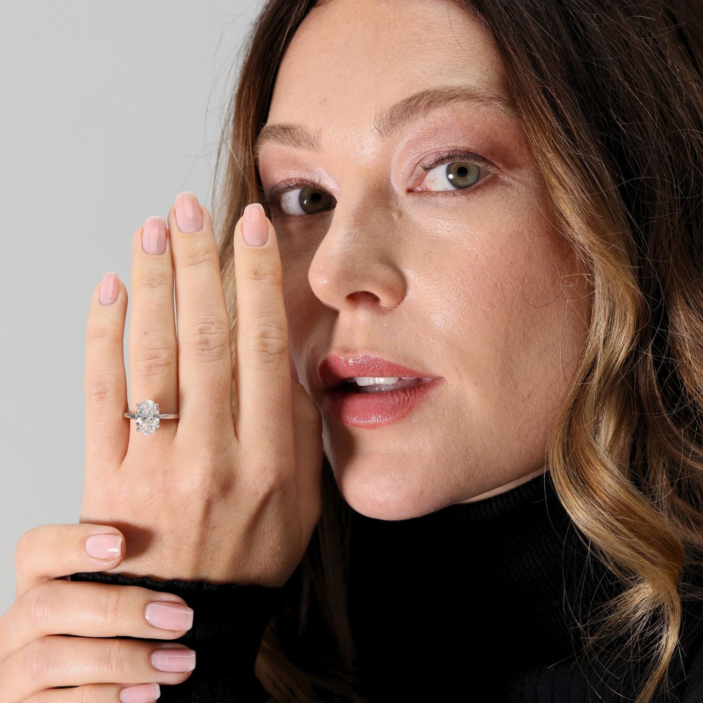 Oval cut laboratory diamond solitaire ring