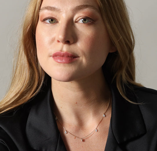 Necklace with pave set droplets