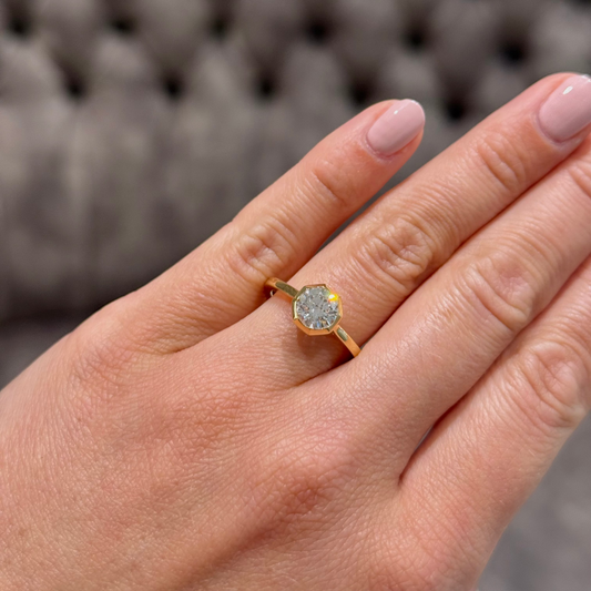 Octagonal set laboratory diamond solitaire ring
