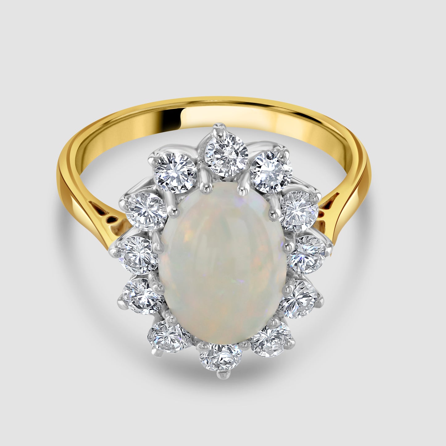 Opal and diamond oval cluster ring