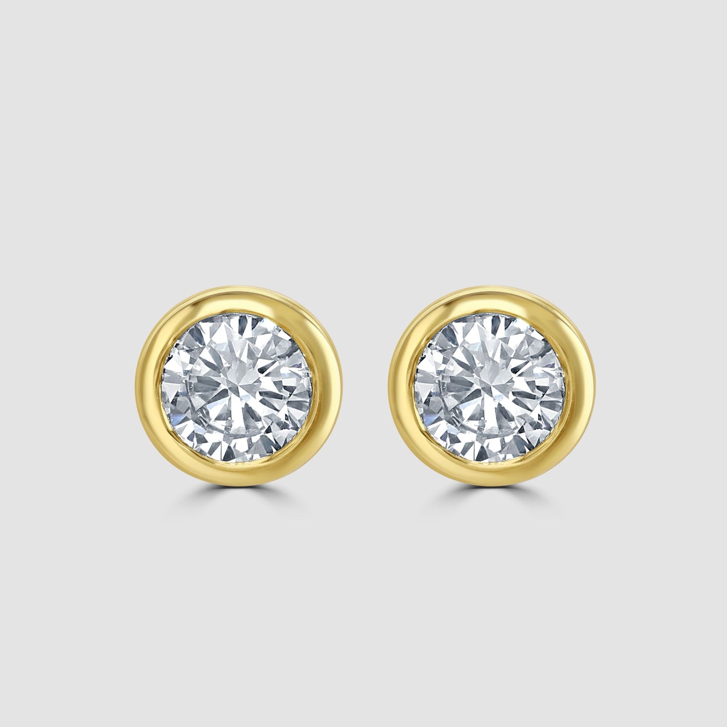 Rub over set diamond stud earrings