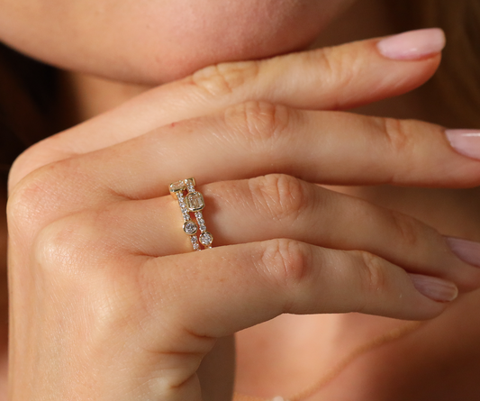 Unusual brilliant and emerald cut diamond ring