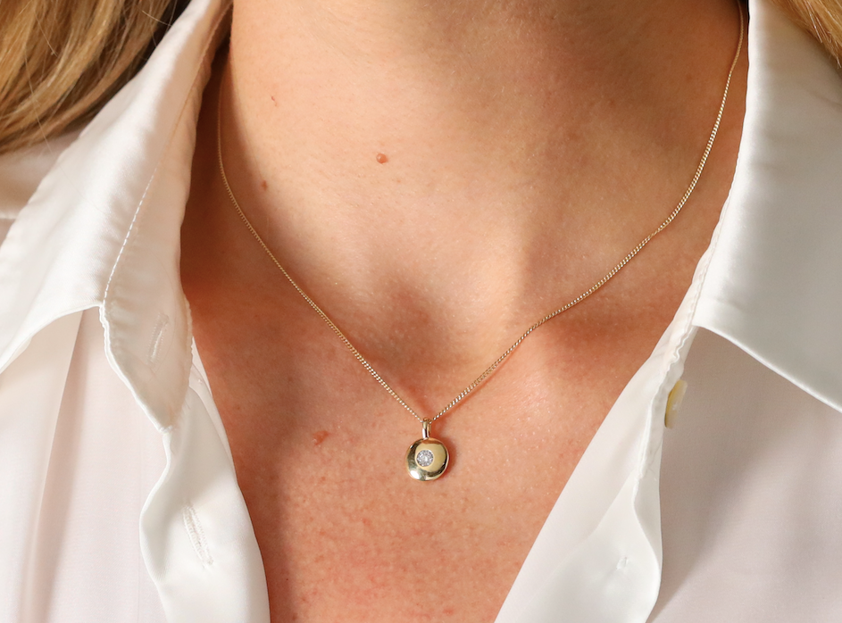 Diamond set circular pendant and chain