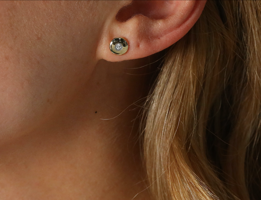 Circular disc diamond set stud earrings