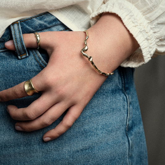 A Wiggle Molten Sterling Silver Bangle from Lulu and Boo Jewellery.