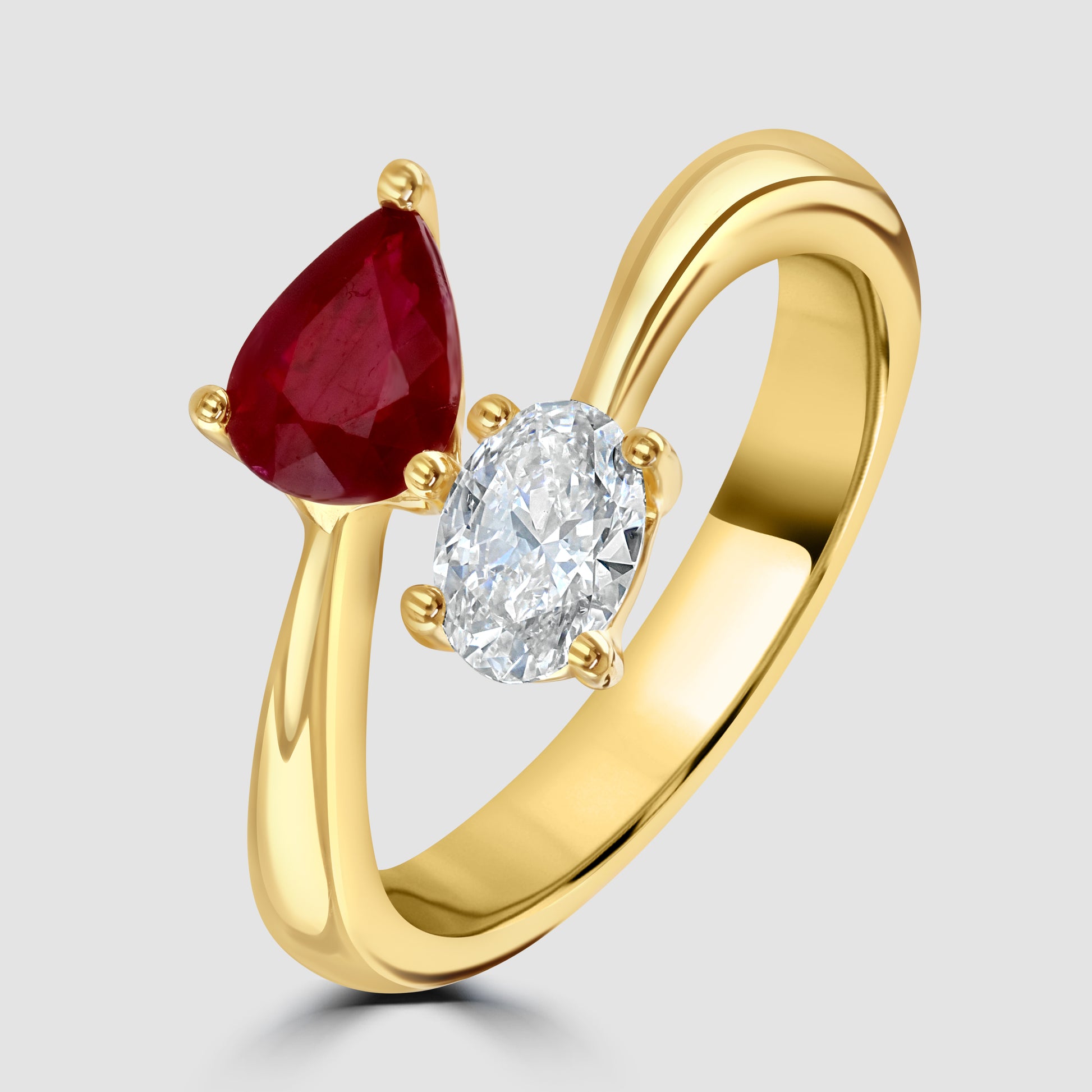 Moi et Toi ruby and diamond crossover ring