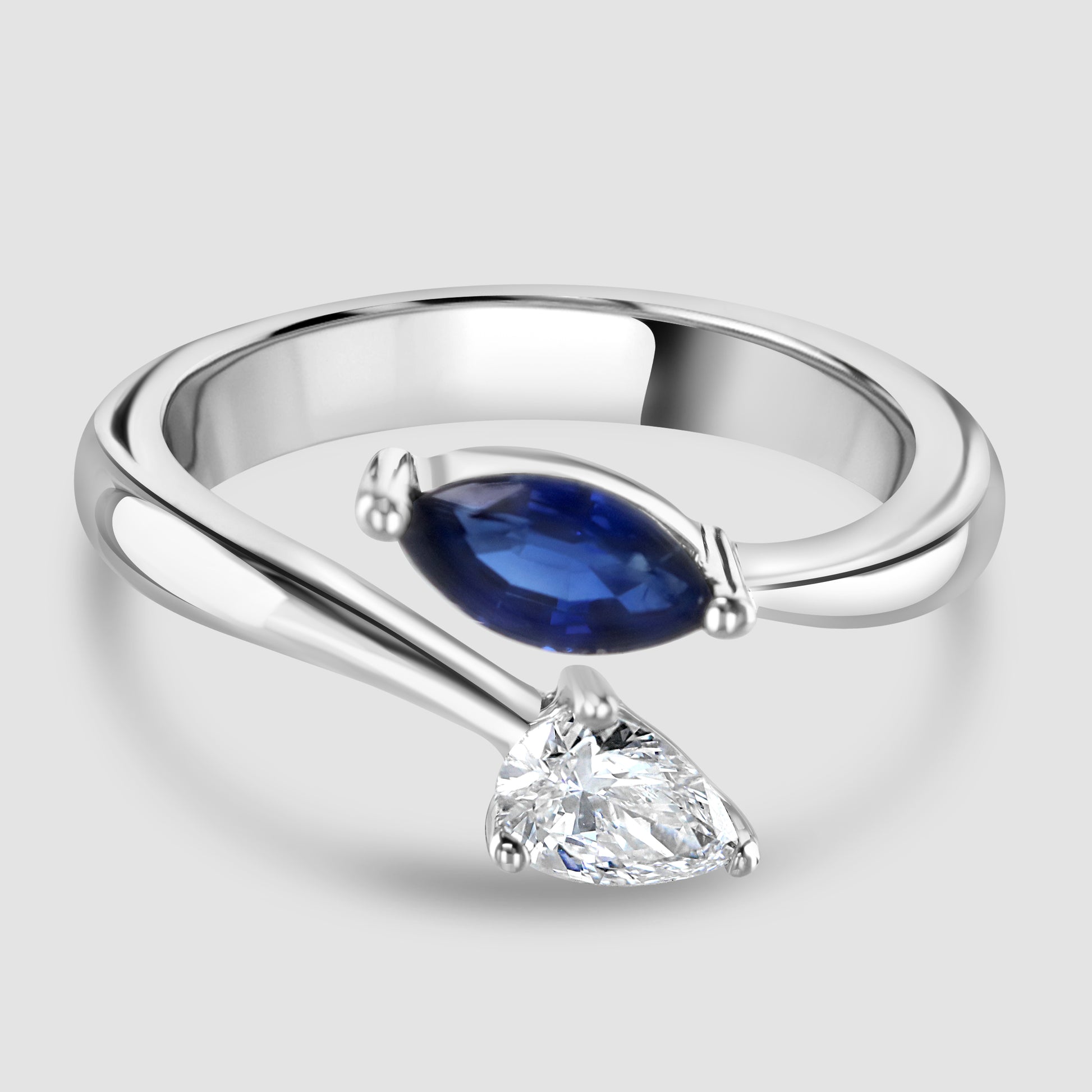 Moi et Toi sapphire and diamond crossover ring