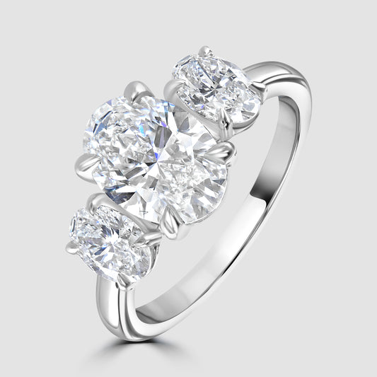 Three stone oval cut Laboratory diamond ring in platinum