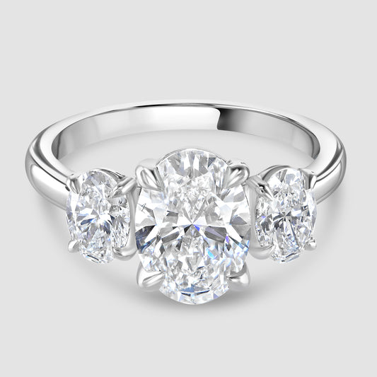 Three stone oval cut Laboratory diamond ring in platinum