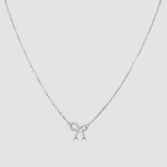 18ct white gold bow design diamond set pendant and chain