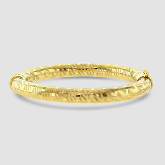 18ct yellow gold engine turned engraved bangle