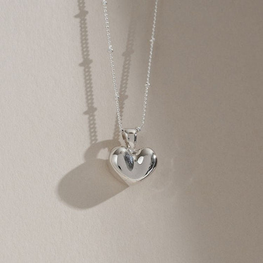 A Sterling Silver Puffy Heart Necklace from Lulu and Boo.