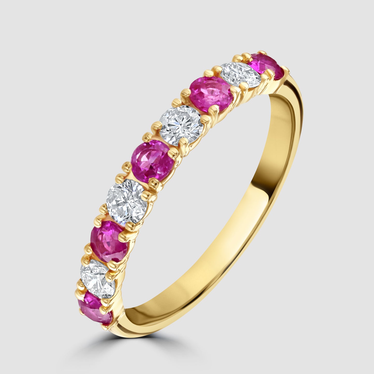 Ruby and diamond half eternity ring