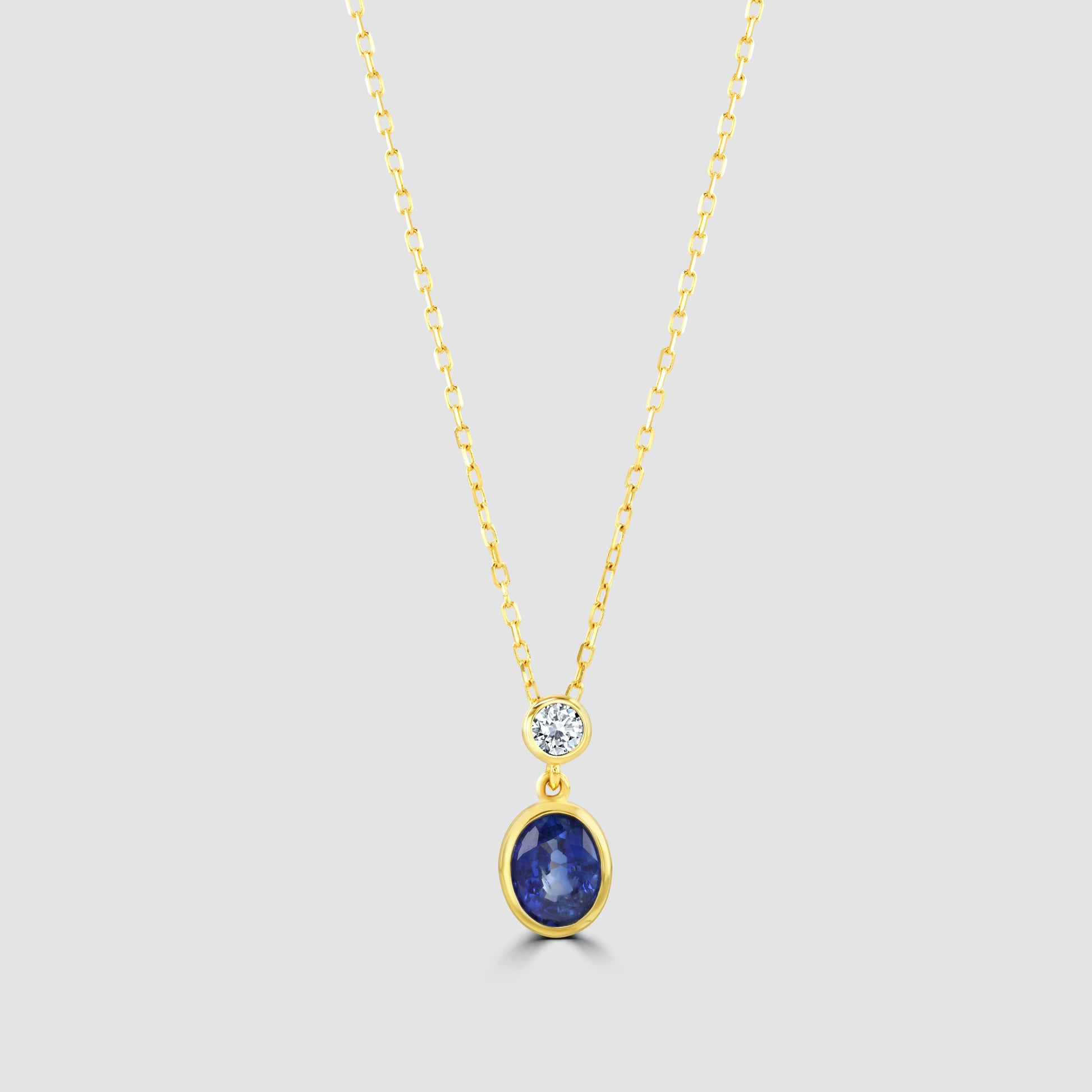 Sapphire and diamond rub over pendant and chain