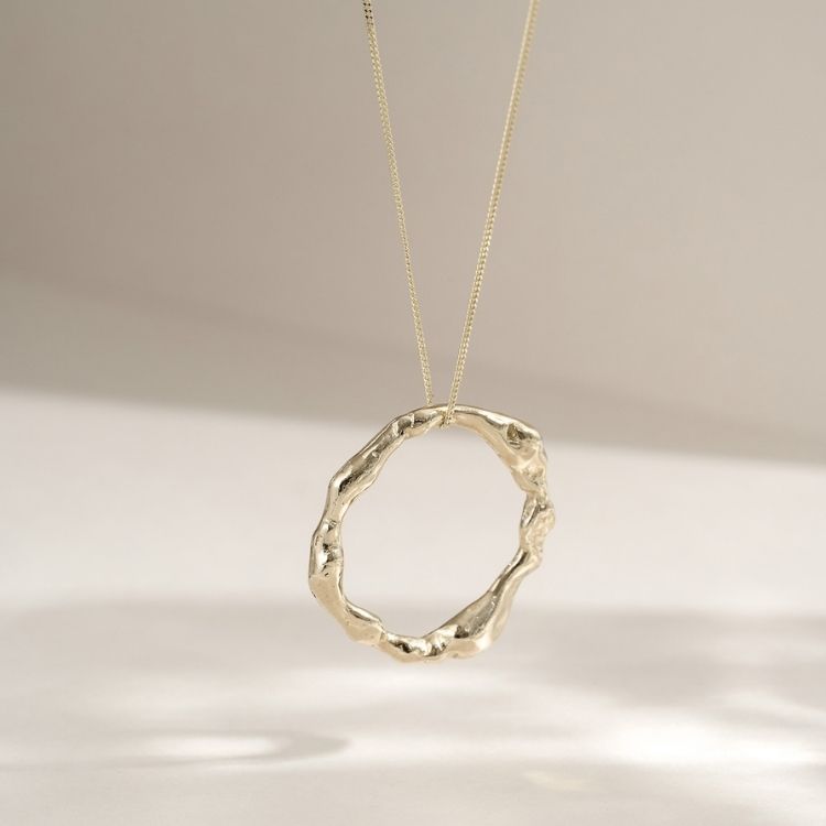 An 18ct gold pendant necklace from Lulu and Boo Jewellery.