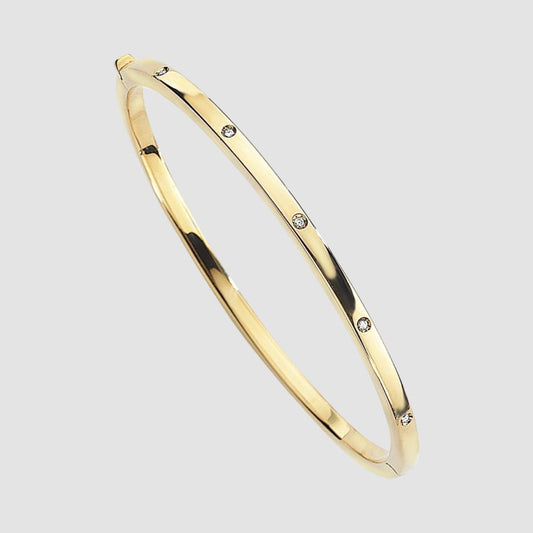 9ct yellow gold diamond set oval bangle