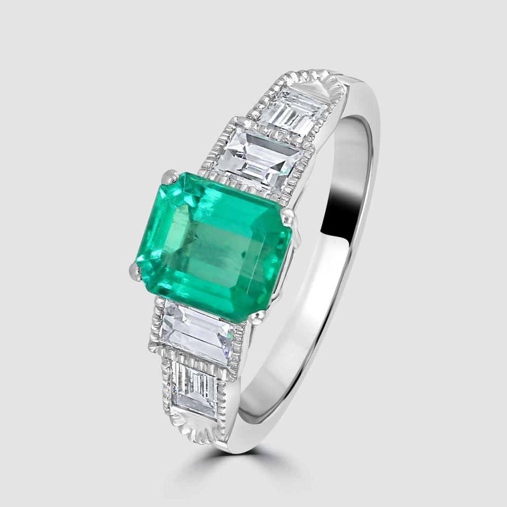 Art Deco style emerald and diamond five stone ring