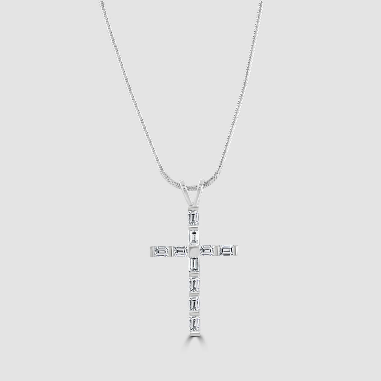 Baguette cut diamond pendant cross and snake chain