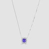 Cushion cut tanzanite and diamond pendant