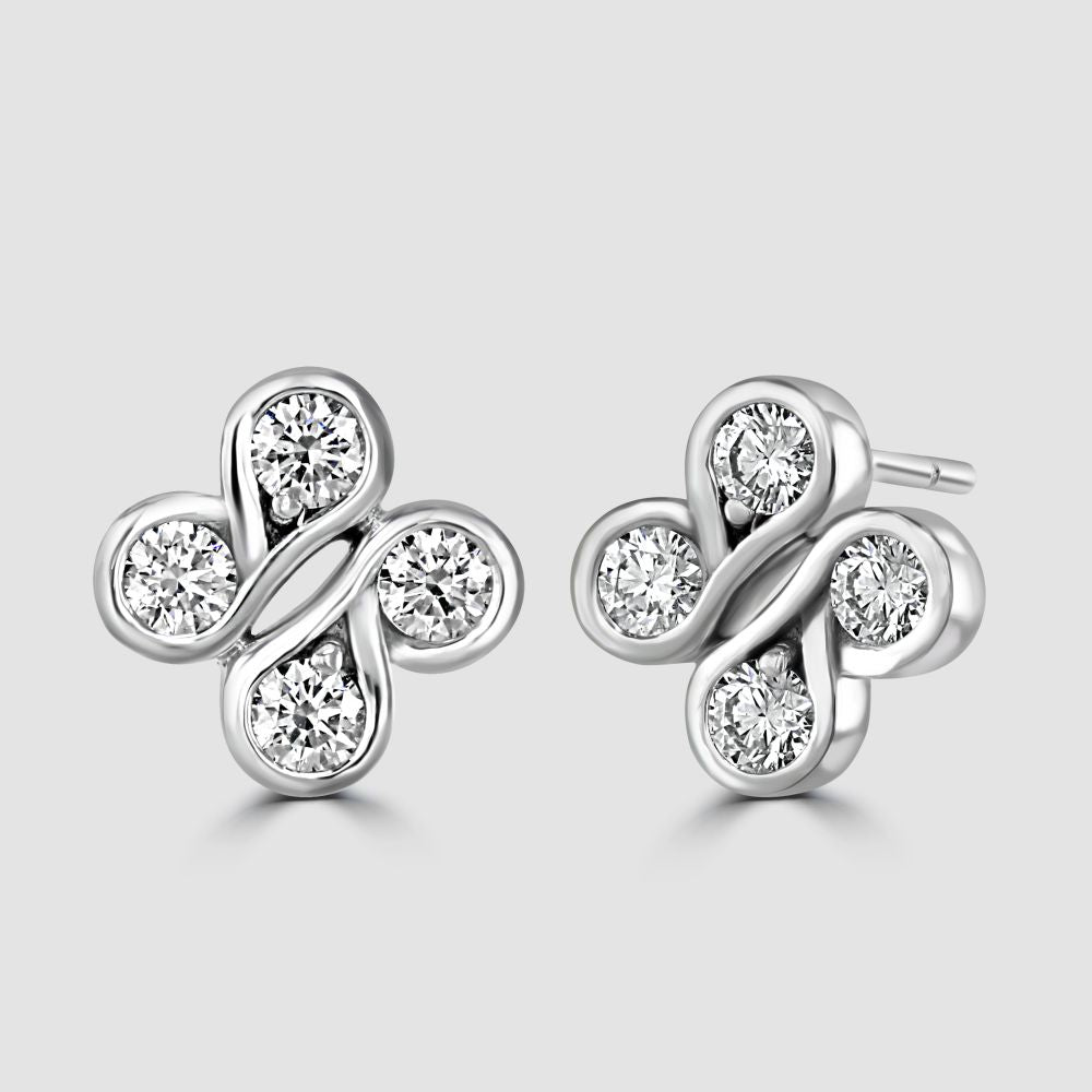 Diamond swirl stud earrings in 18ct white gold