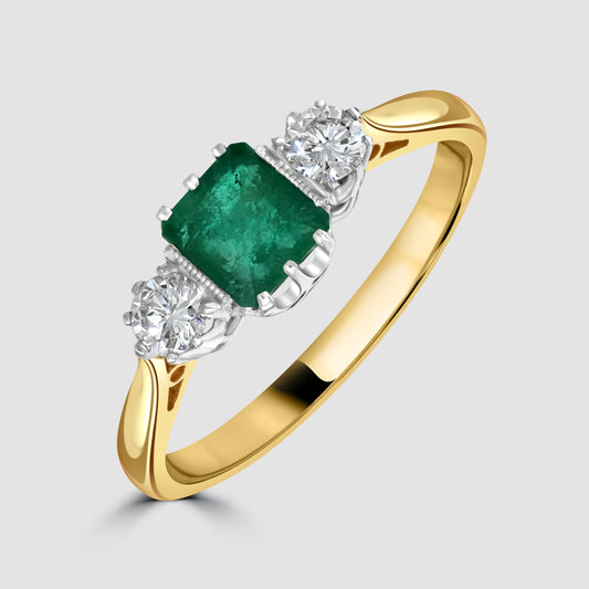 Emerald and diamond three stone ring
