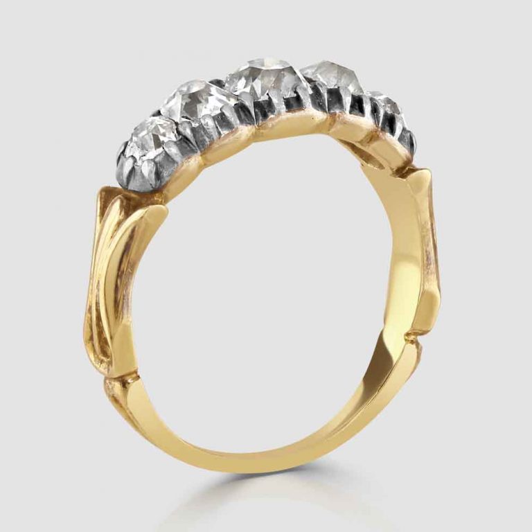 Gold diamond five stone ring with silver settings