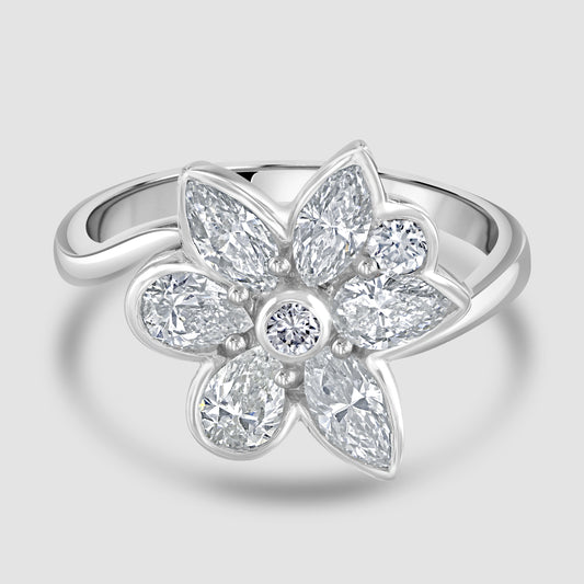 Floral white and blue diamond ring by ‘Hirsh’