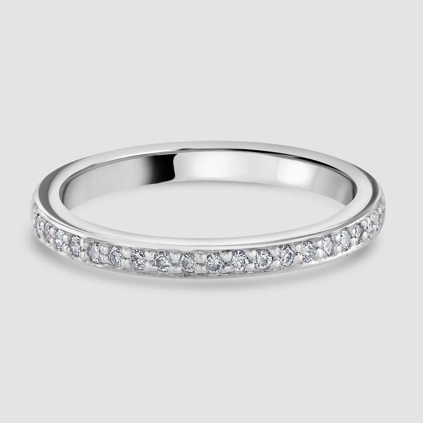 Platinum claw set diamond half eternity ring