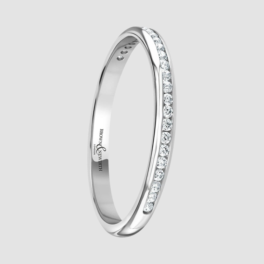 Diamond half eternity ring