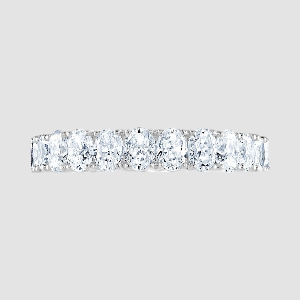 Claw set diamond eternity ring